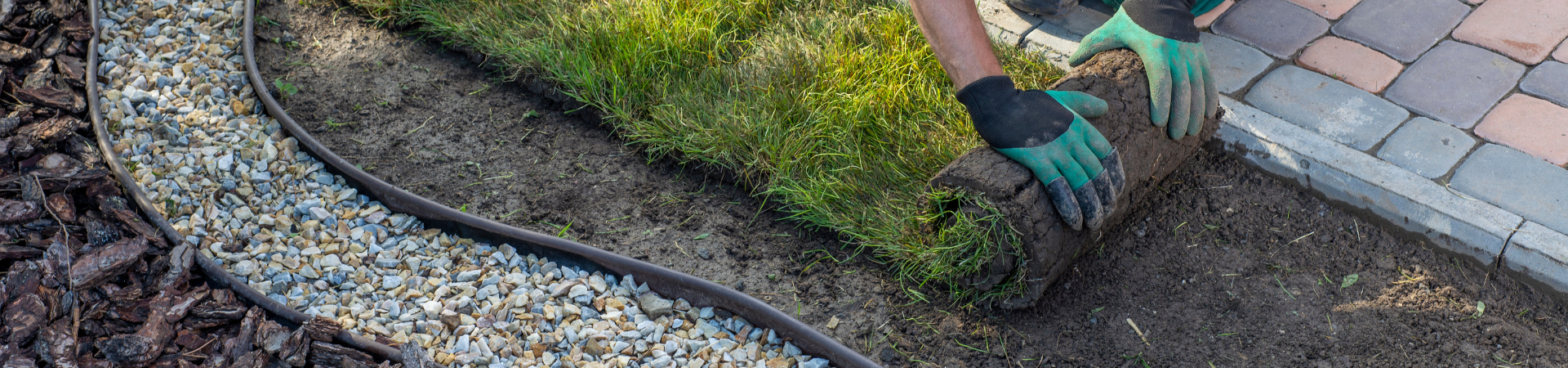 landscaper laying sod